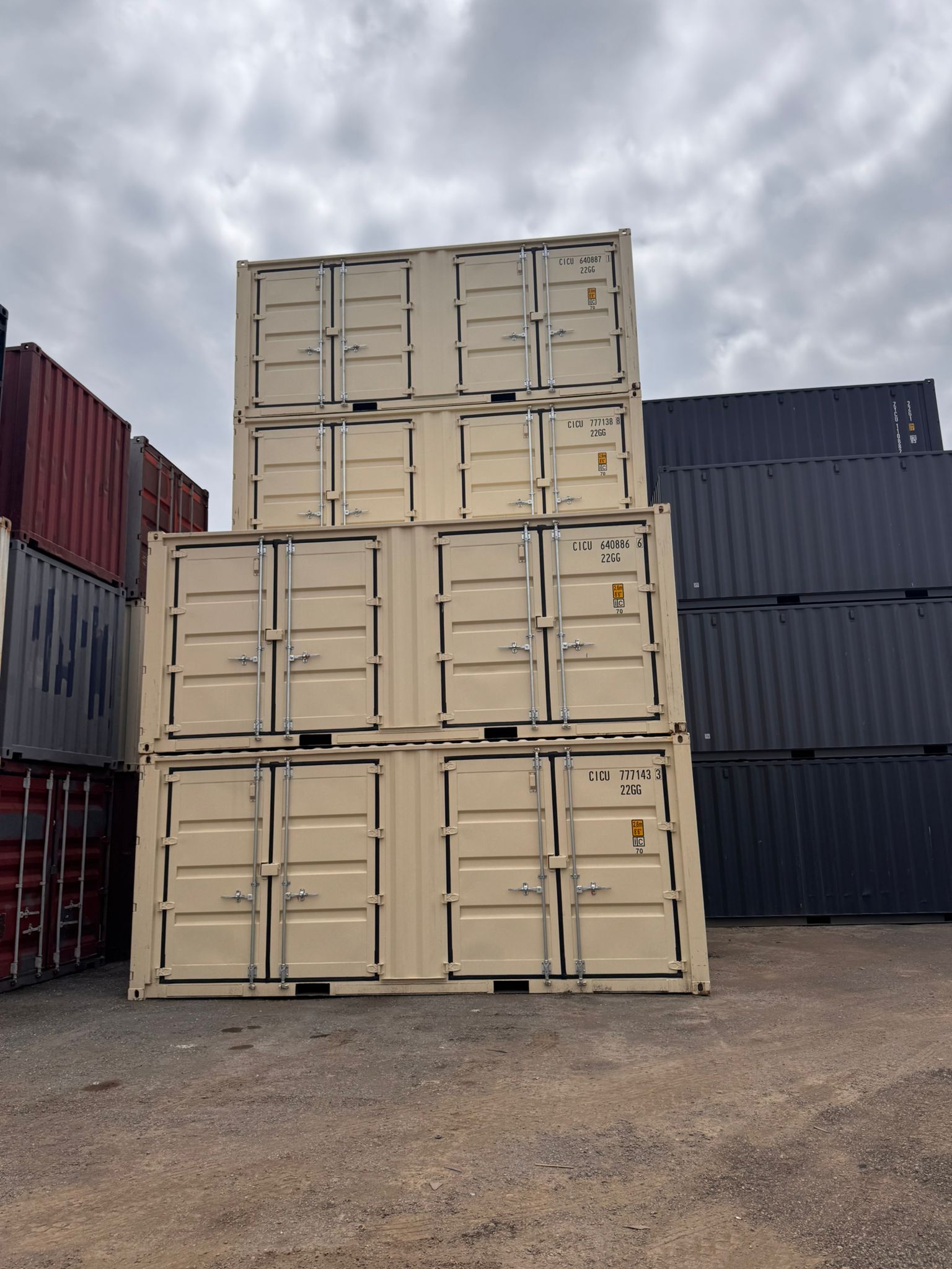 20ft new one-trip open side shipping containers stacked at Lyonheart Containers yard Ontario