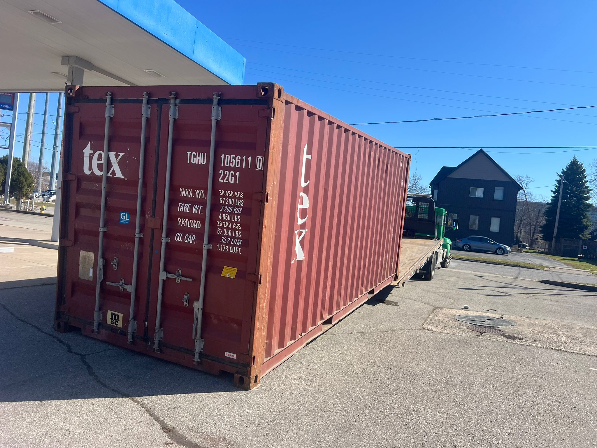 20ft used container being delivered by Lyonheart Containers to Ontario customer