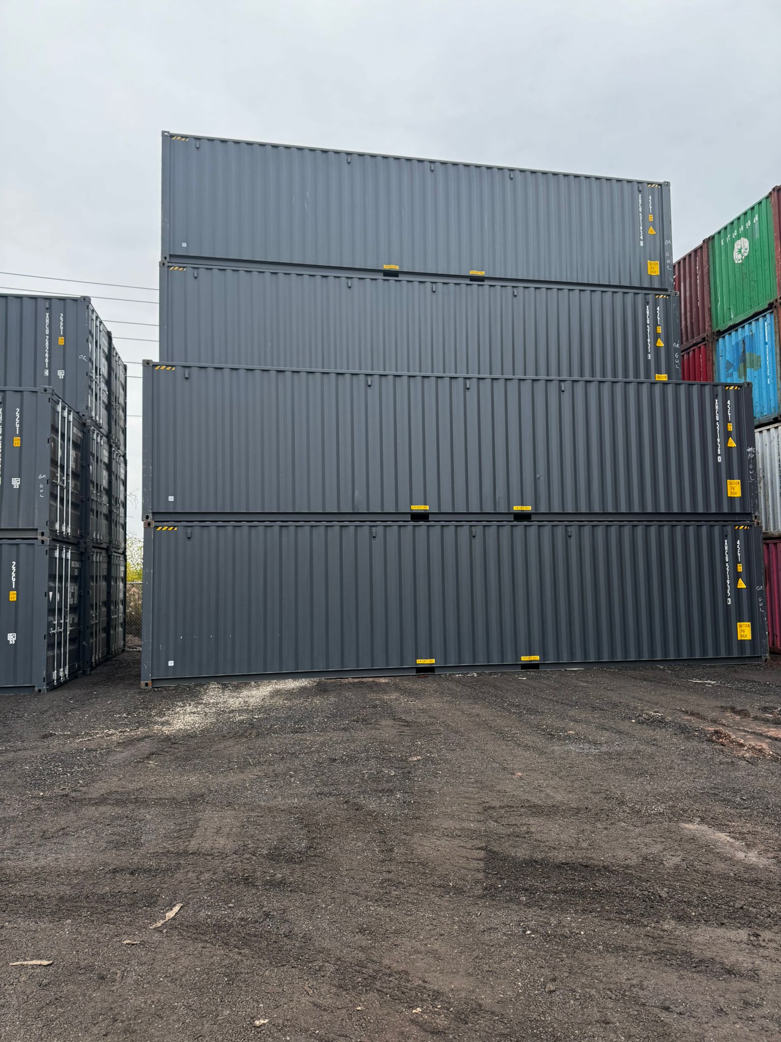 40ft high cube new one-trip shipping containers stacked at Lyonheart Containers yard Ontario