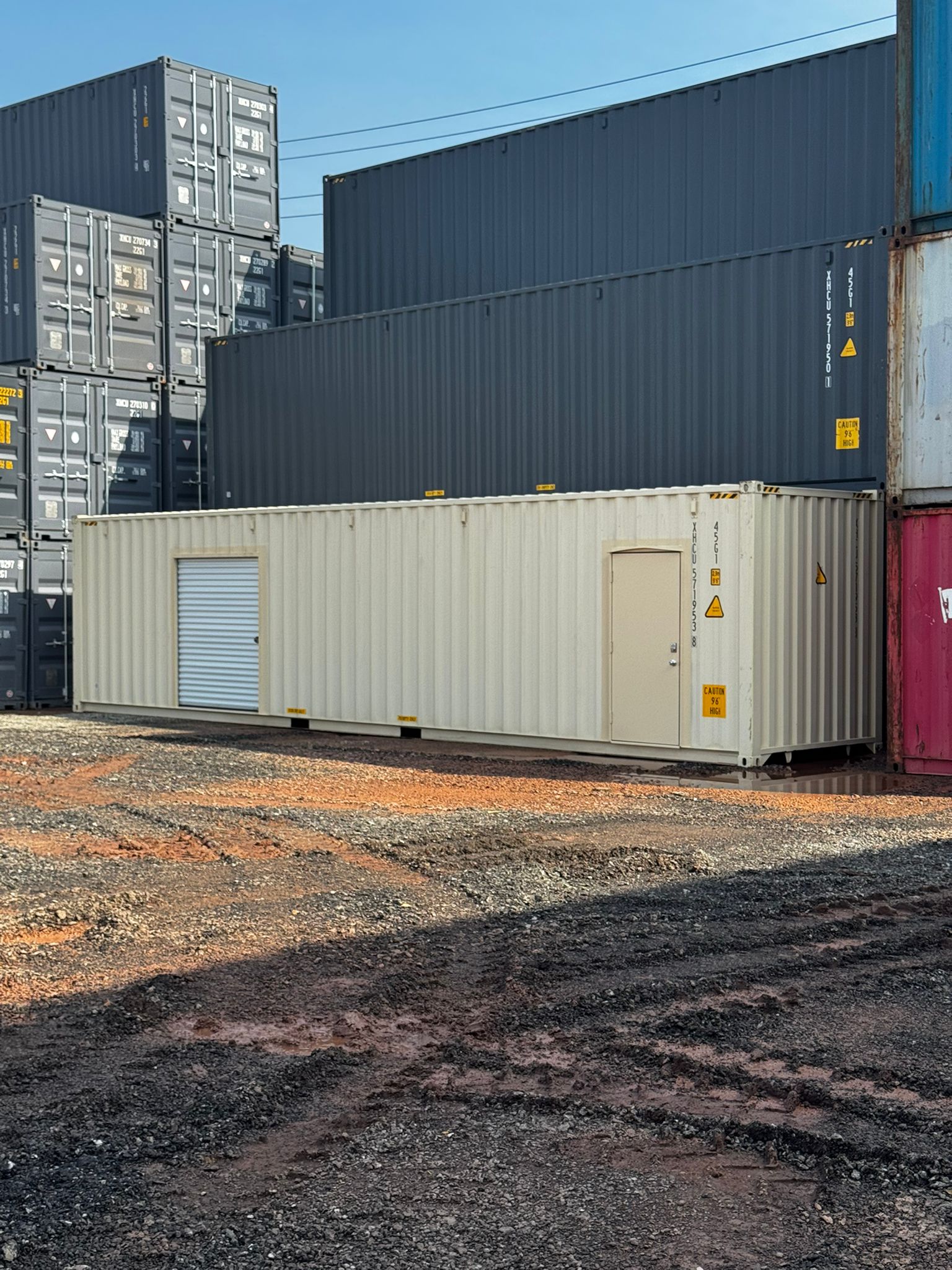 Container with custom roll-up door and personnel door modification by Lyonheart Containers Ontario